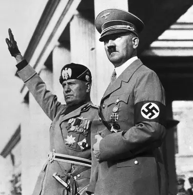 Benito Mussolini and Adolf Hitler on Review Stand Benito Mussolini and Adolf Hitler watch a Nazi parade staged for the Italian dictators