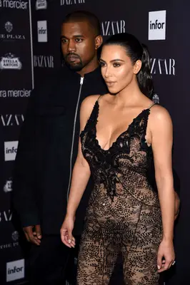 Kanye West and Kim Kardashian West attend Harper