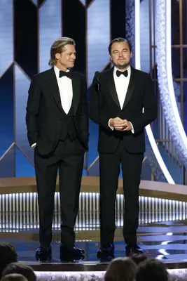 BEVERLY HILLS, CALIFORNIA - JANUARY 05: In this handout photo provided by NBCUniversal Media, LLC, Brad Pitt and Leonardo DiCaprio speak onstage during the 77th Annual Golden Globe Awards at The Beverly Hilton Hotel on January 5, 2020 in Beverly Hills, California. (Photo by Paul Drinkwater/NBCUniversal Media, LLC via Getty Images) 