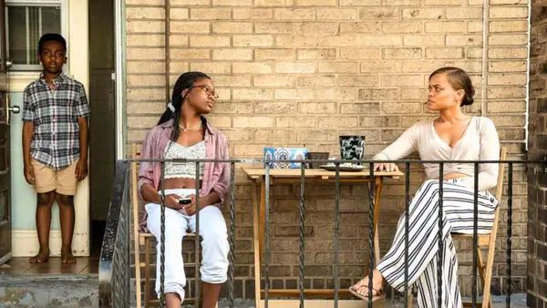 Anthony B. Jenkins, Andra Day, and Demi Singleton in a still from 