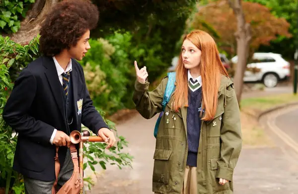 Zac Looker and Emily Carey in a still 