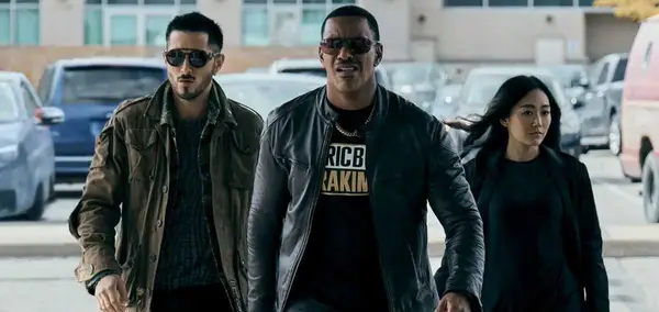 Laz Alonso, Tomer Capone, and Karen Fukuhara in a still from 