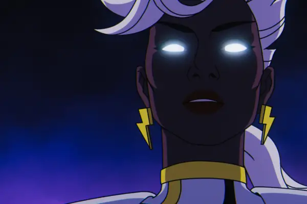 A close-up of X-Men character Storm, whose eyes are glowing a bright white