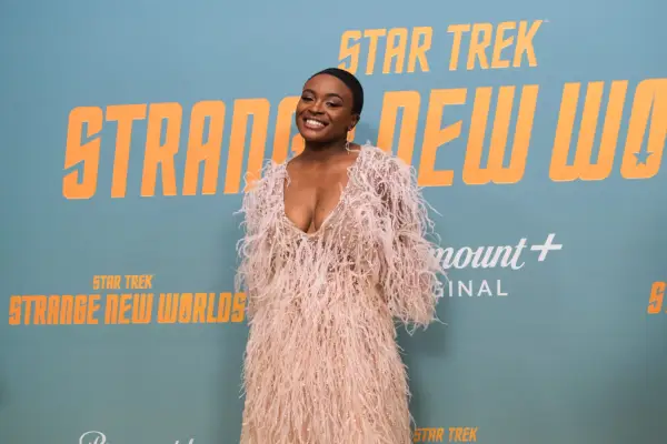 Celia Rose Gooding in a pink fluffy dress