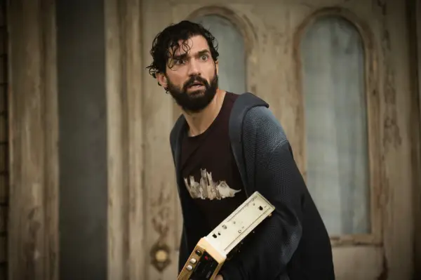 David Alpay in From season 2, looking scared