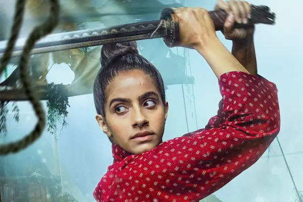 Mandip Gill as Yaz holds a sword