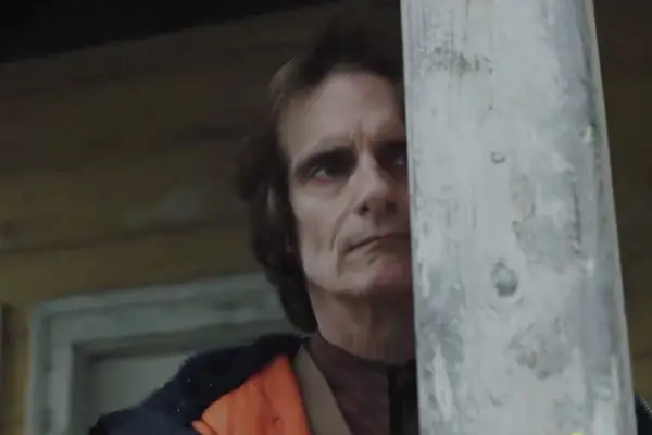 From season 3 still showing Victor peeking from behind a pillar