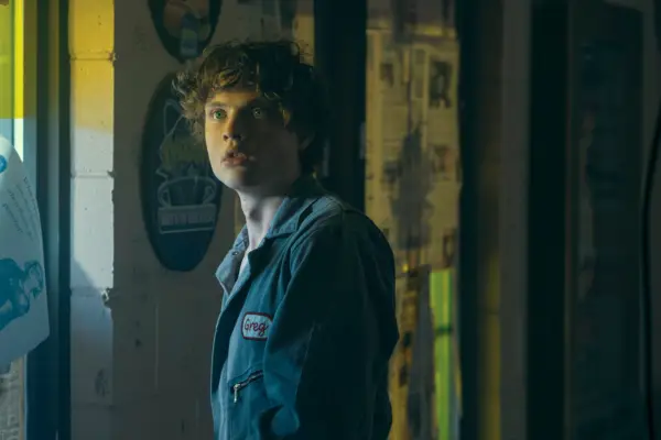 Asa Germann (Sam) in Gen V wearing blue overalls