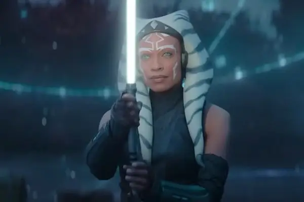 Rosario Dawson as Ahsoka Tano brandishing a lightsaber in Ahsoka.