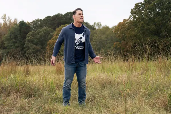 John Cena stars in Peacemaker; in this scene, Chris Smith is yelling as he is abandoned on the uninhabited prison planet Salvation