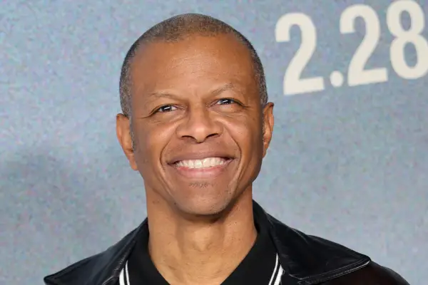 Phil LaMarr smiles at a premiere event