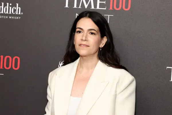 Abbi Jacobson wears a white blazer at an event hosted by Time Magazine