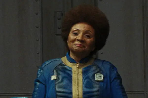 Leslie Uggams stars in Fallout in blue and yellow overalls