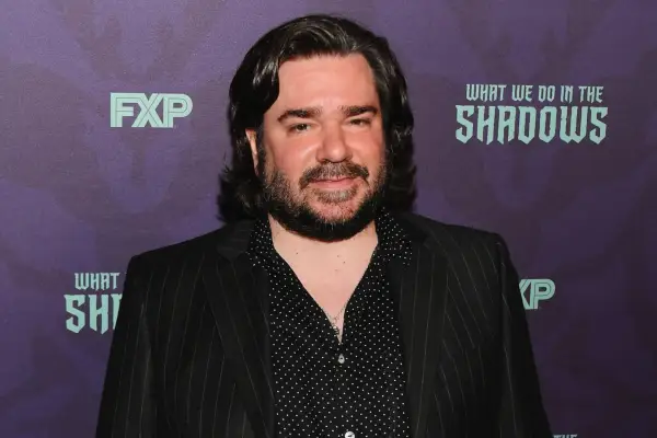 Matt Berry wears a black suit at the premiere of What We Do in the Shadows