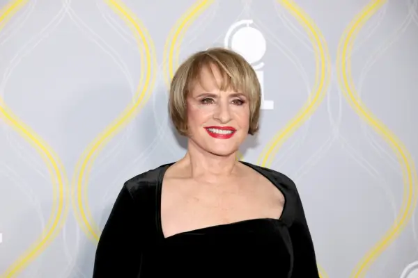 Patti Lupone wearing a black dress