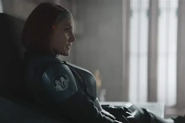 Katee Sackhoff as Bo-Katan Kryze in The Mandalorian sitting down, looking off camera