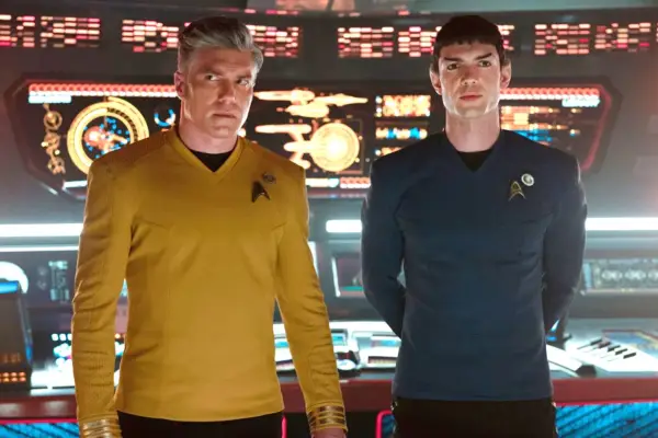 Anson Mount and Ethan Peck in Star Trek: Strange New Worlds standing together looking concerned