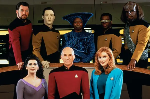 Star Trek: The Next Generation cast gathered together looking into camera