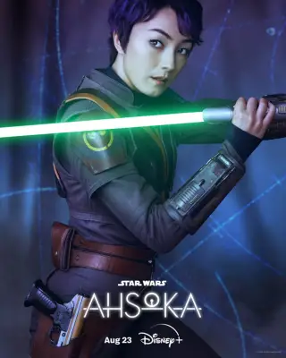 Natasha Liu Bordizzo as Sabine Wren holding a green lightsaber in Ahsoka.