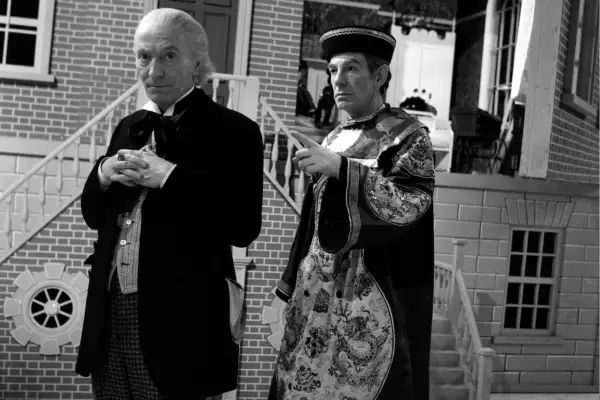 William Hartnell and Michael Gough in Doctor Who: The Celestial Toymaker, with Gough in a robe standing behind Hartnell in a suit