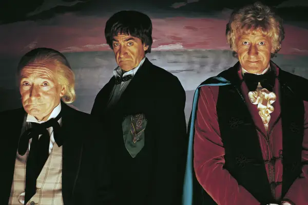 William Hartnell, Patrick Troughton and Jon Pertwee as the Three Doctors looking into camera
