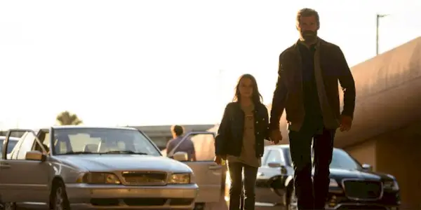 Laura and Logan Holding Hands and Walking in Logan 2017