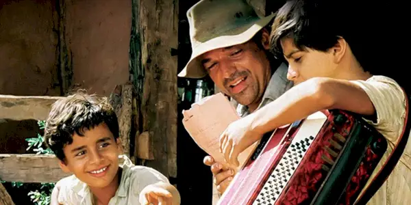 A man with two children in Two-Sons-of-Francisco.