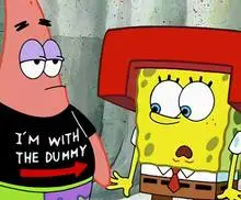 Patrick wearing a black shirt with text that says 