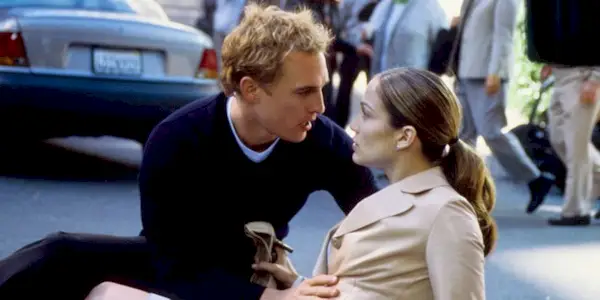 Matthew McConaughey and Jennifer Lopez starring at each other in The Wedding Planner