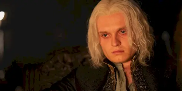 Tom Glynn-Carney as Aegon II Targaryen staring off into space in House of the Dragon Season 2