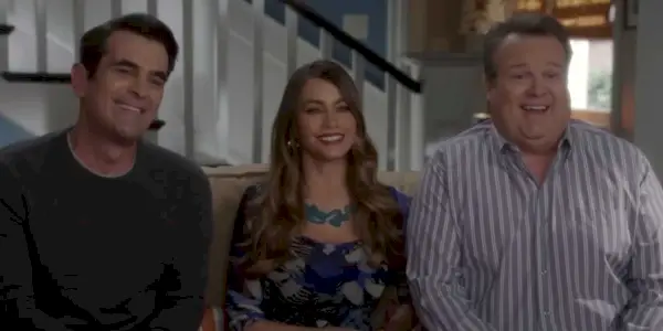 Gloria (Sofía Vergara), Phil (Ty Burrell), and Cam (Eric Stonestreet) in Modern Family
