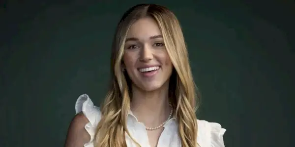 Sadie smiling in a promotional image for 