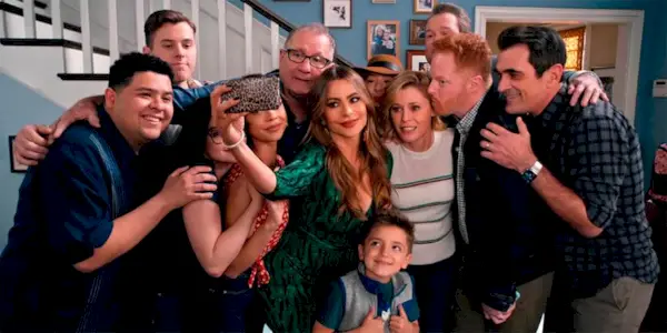 The cast of Modern Family taking a selfie in the series finale
