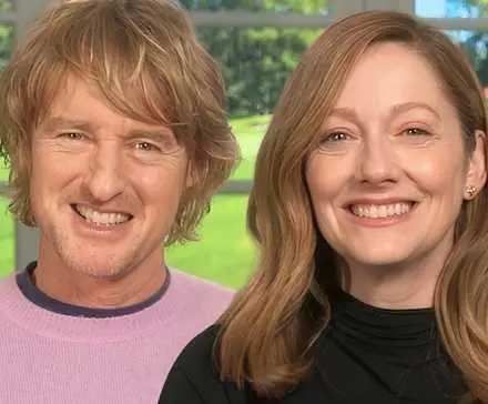 Image via Jefferson Chacon of Owen Wilson smiling next to Judy Greer for the Apple TV+ series Stick