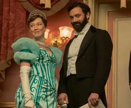 Carrie Coon and Morgan Spector standing in an opera box in The Gilded Age Season 2 finale.