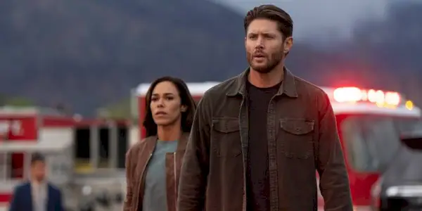 Jensen Ackles as Meachum walking into the crime scene with Jessica Camacho as Oliveras in Countdown