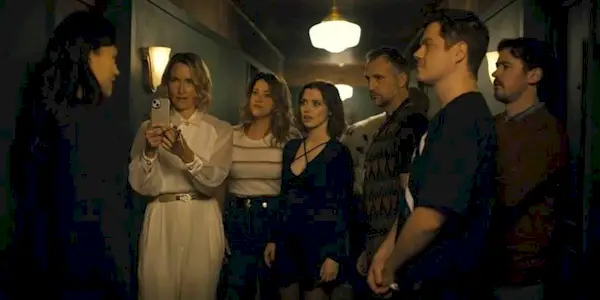 The cast stand in a hallway in the Shudder slasher series Hell Motel