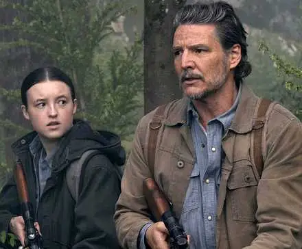 Pedro Pascal with a gun in the woods next to Bella Ramsey in The Last of Us