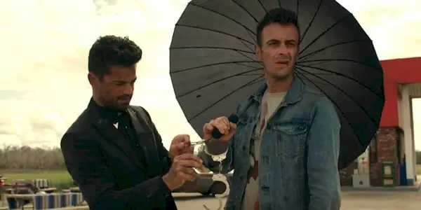 Jesse (Dominic Cooper) takes the cuffs off the vampire Cassidy (Joseph Gilgun) in the TV show Preacher.