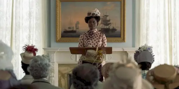 Denee Benton as Peggy speaking to a crowd in The Gilded Age Season 3 Episode 4.