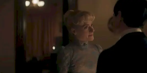  Marian (Louisa Jacobson) talking to Oscar (Blake Ritson) in The Gilded Age Season 3 Episode 6