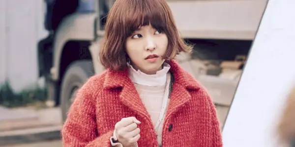 A shot of Park Bo Young clenching her fist in Strong Woman Do Bong Soon