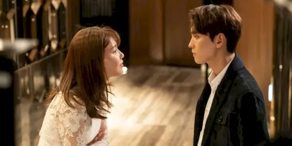 Sooyoung and Choi Tae Joon looking at each other in in So I Married The Anti-Fan