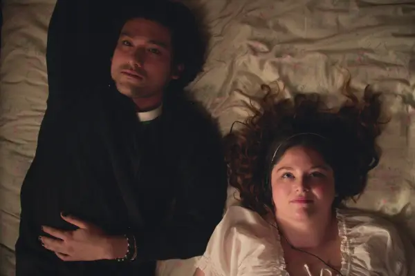 Will Sharpe and Megan Stalter star in Too Much, lying on a bed together and staring contentedly at the ceiling