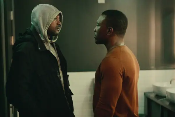 Mimi Keene as Ruby and Asa Butterfield as Otis in Sex Education Season 4 walking together with bicycles