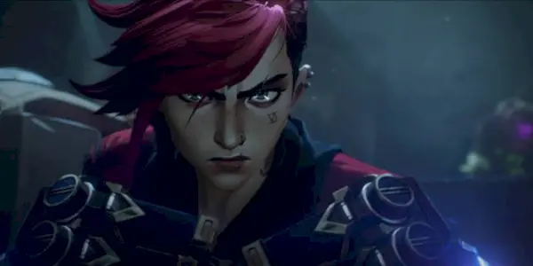 Vi frowning and staring directly into the camera in 