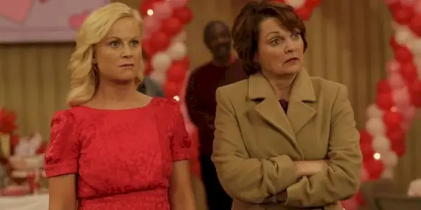 Two women standing next to each other