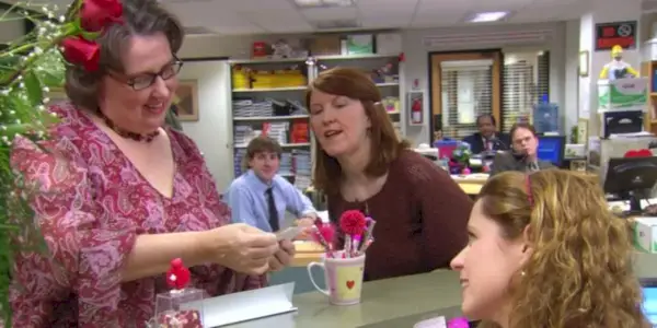 Three women at recptionist desk
