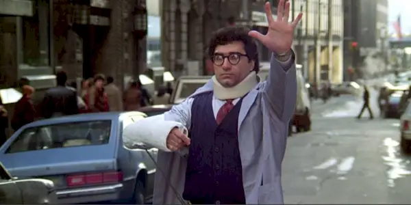Eugene Levy wearing an arm cast in Splash