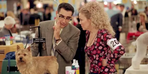 Gerry whispering to Cookie while at a dog show in Best In Show